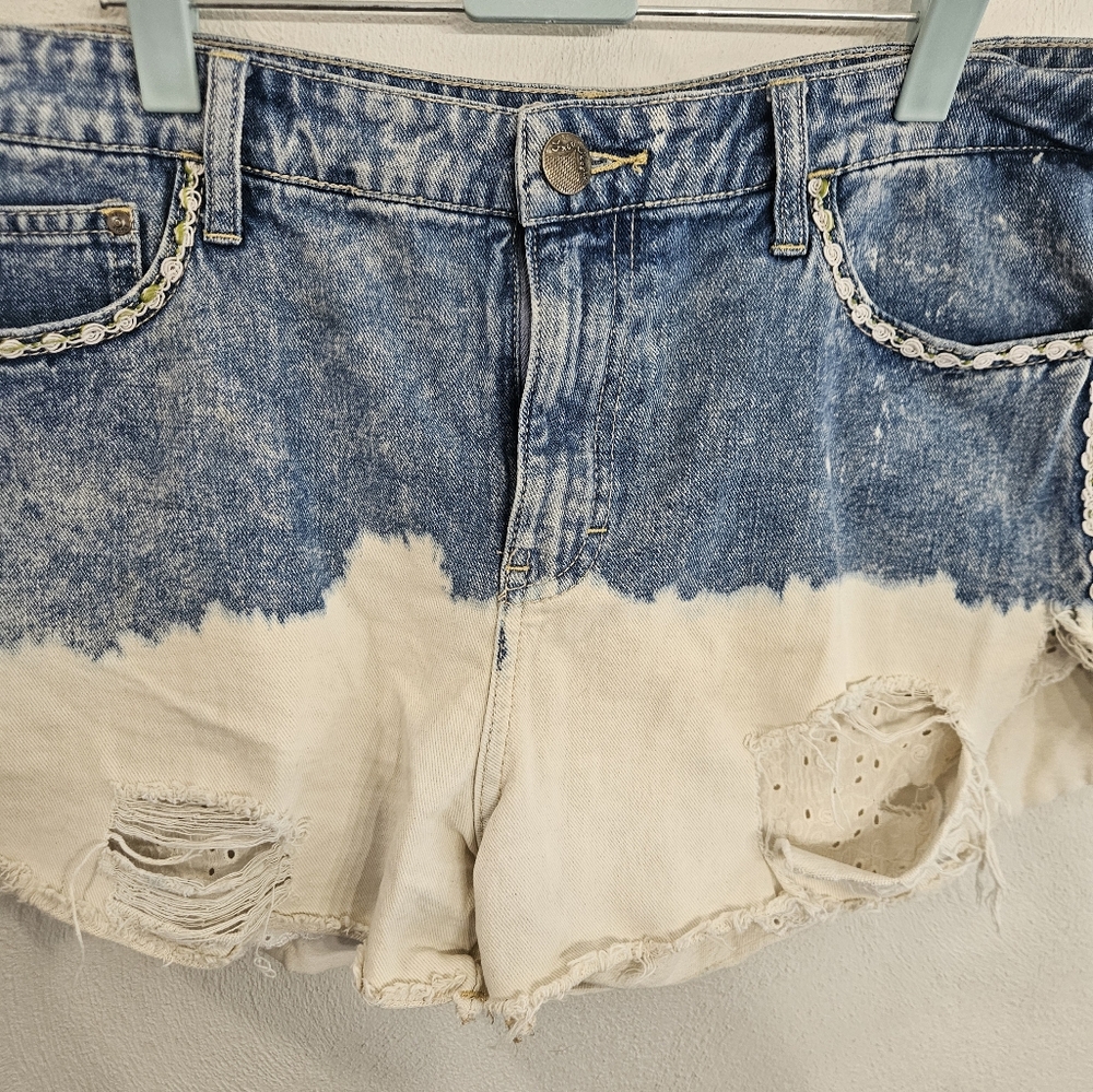 Free People destructed denim shorts bleached out cut offs sz 31 with 18" waist.